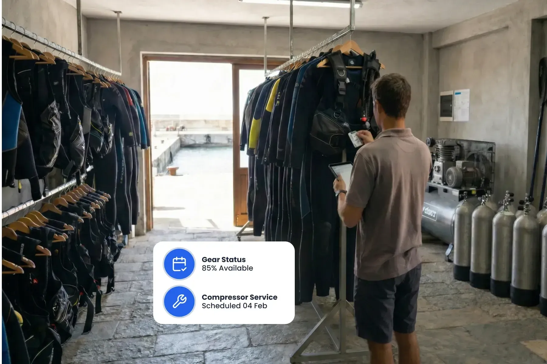 Staff member in the gear room using Bloowatch to track equipment availability, maintenance, and inventory status.