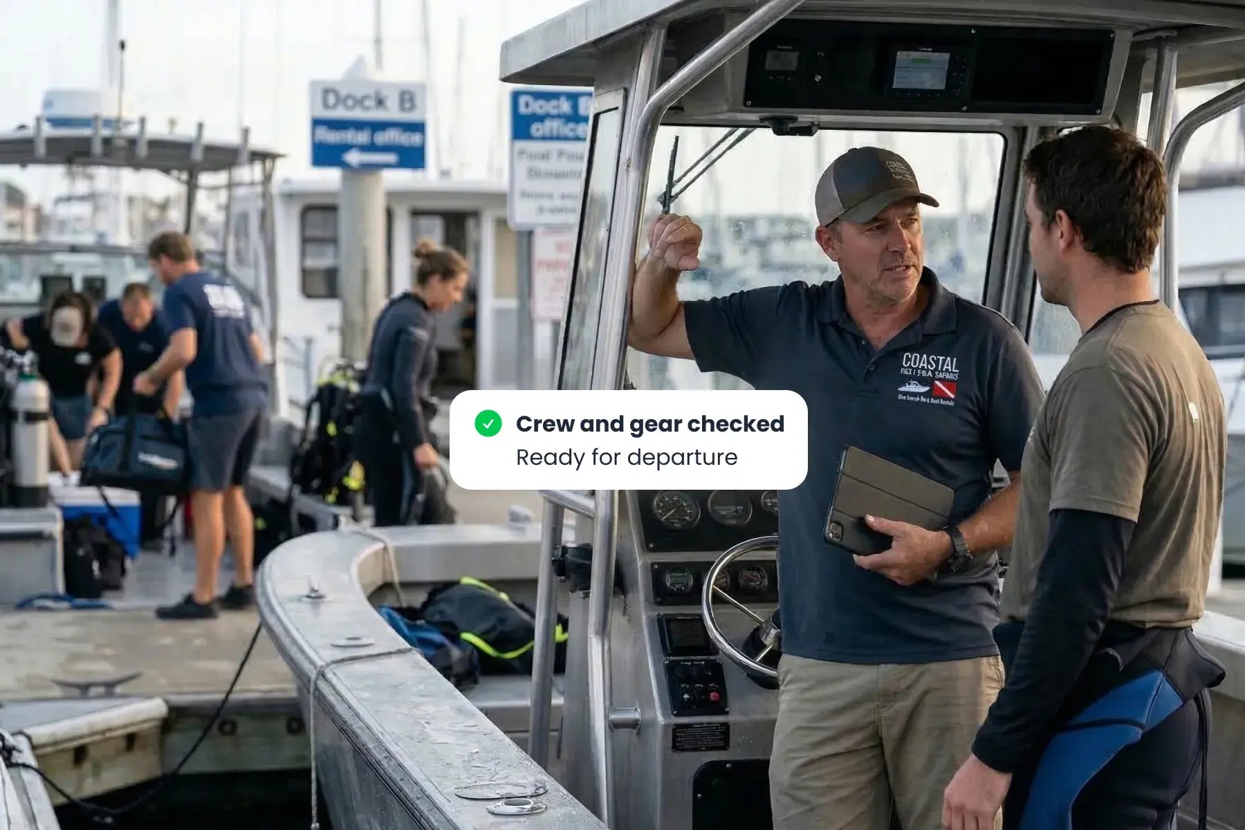 Dive trip boat planning interface in Bloowatch showing group assignments and departure scheduling