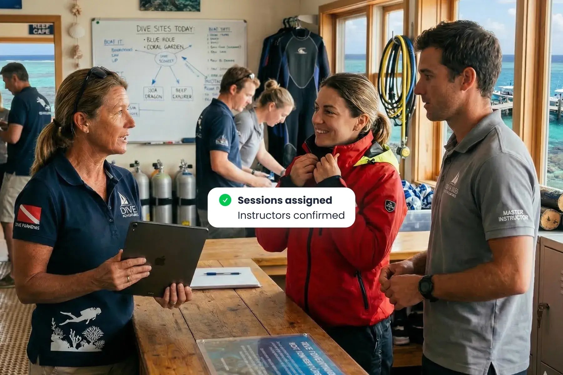 Dive resort resource assignment panel allocating staff, gear, and boats per session in Bloowatch