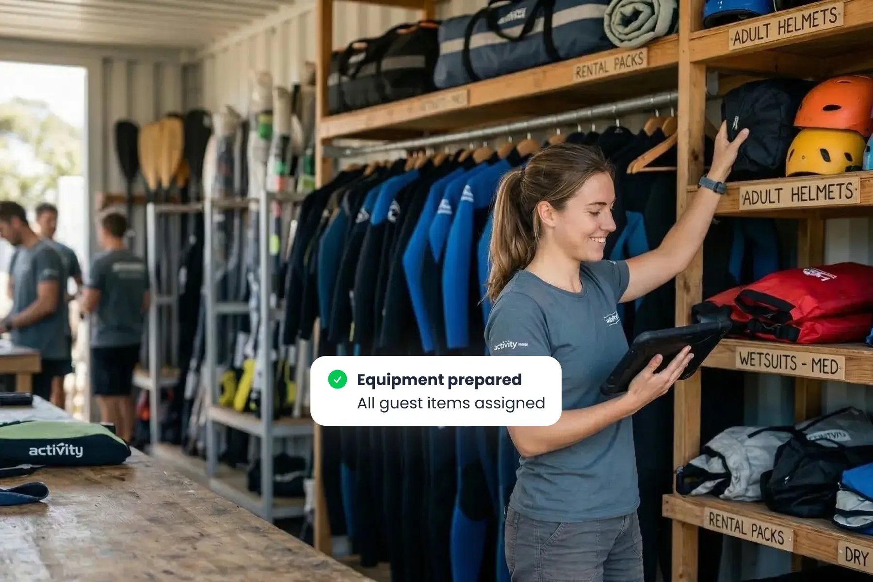 Staff member using Bloowatch to assign and prepare rental gear for each guest before check-out.